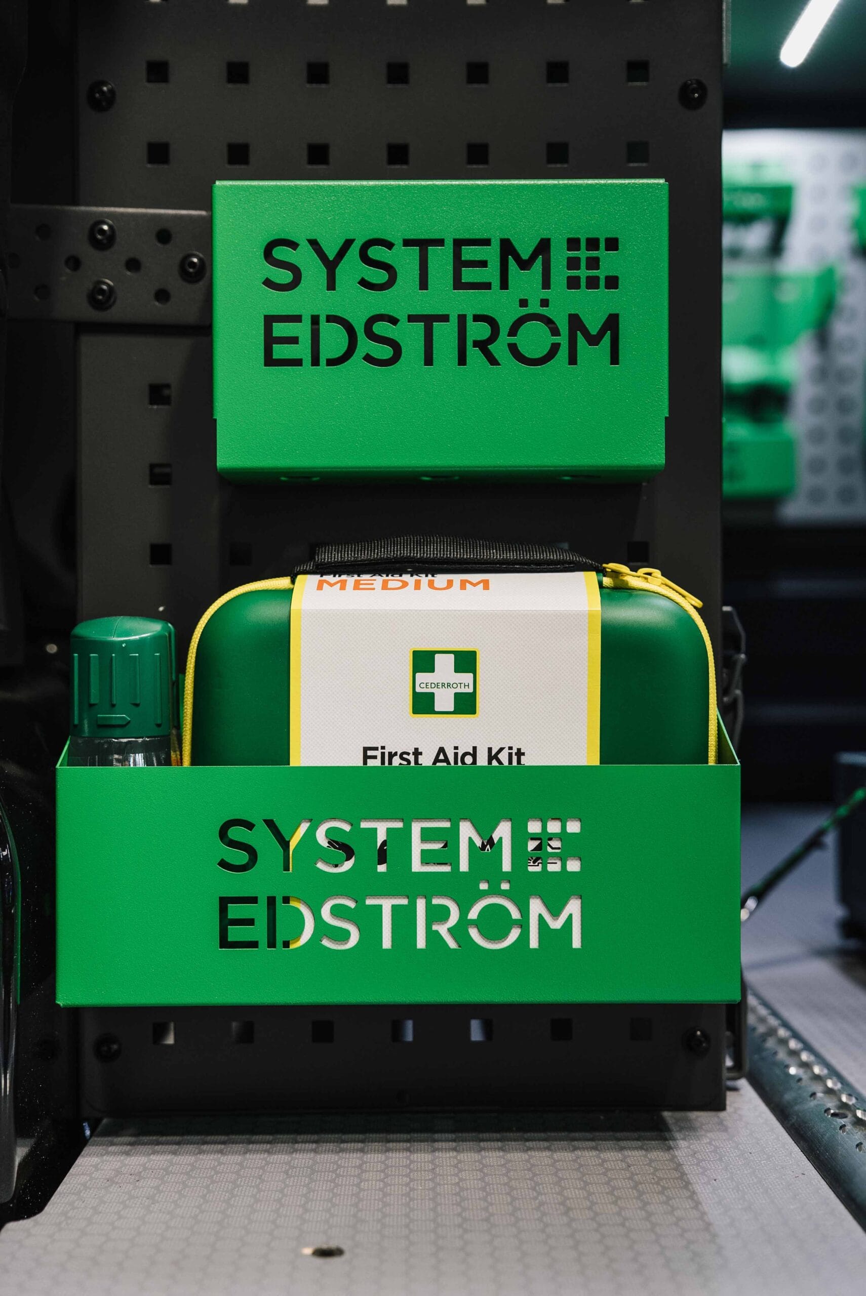 First aid kit with holder